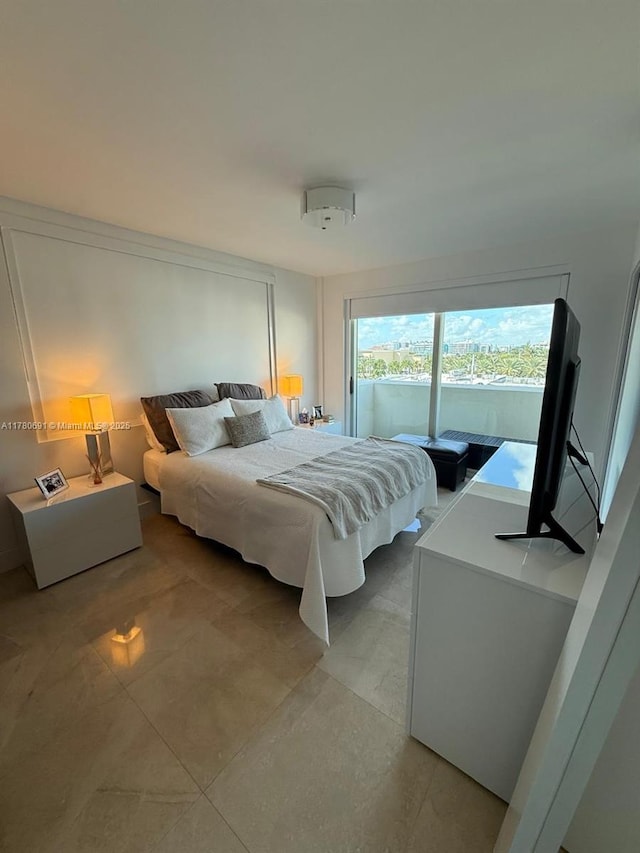 9499 Collins Ave Unit 411, Surfside, FL 33154 - bedroom with access to exterior