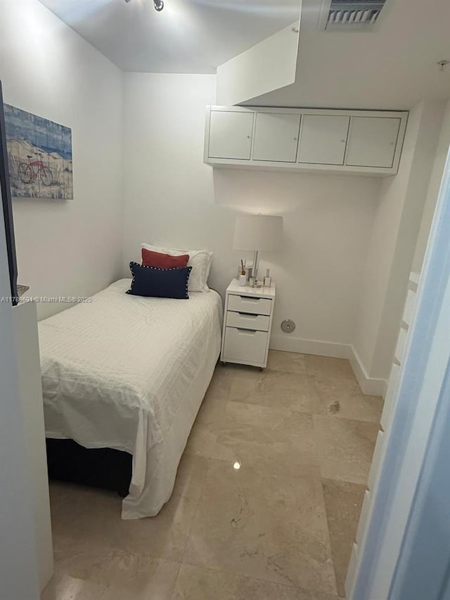 9499 Collins Ave Unit 411, Surfside, FL 33154 - bedroom with baseboards