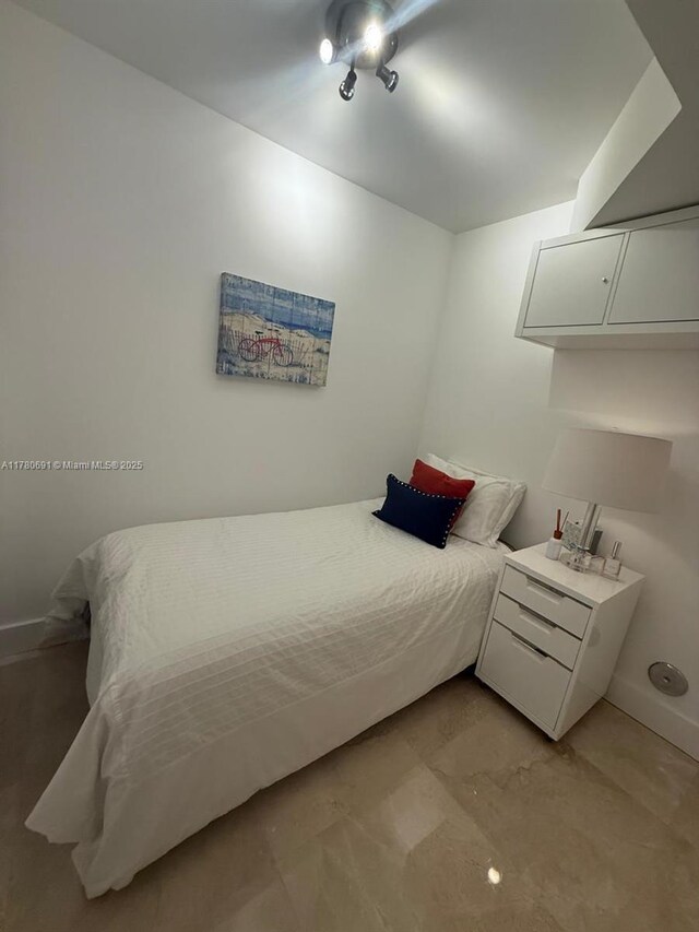 9499 Collins Ave Unit 411, Surfside, FL 33154 - bedroom with baseboards