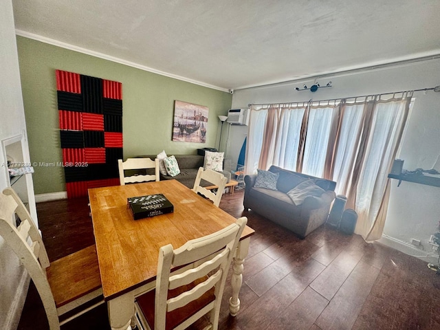 1734 Wiley St, Hollywood, FL 33020 - dining area with an AC wall unit, ornamental molding, and wood finished floors