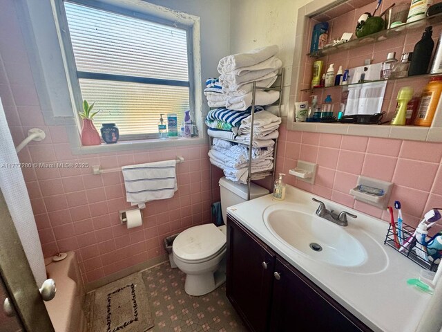 1734 Wiley St, Hollywood, FL 33020 - full bathroom with vanity, tile walls, and toilet