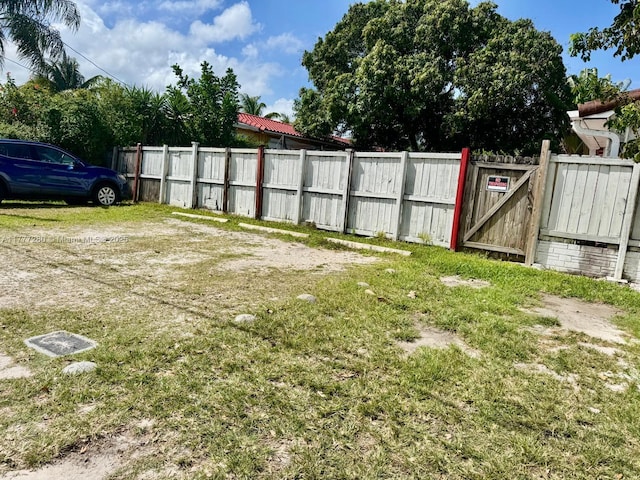 1734 Wiley St, Hollywood, FL 33020 - view of yard featuring fence and a gate