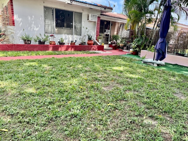 1734 Wiley St, Hollywood, FL 33020 - view of yard with a wall unit AC