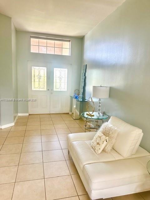 3315 18 W, Lehigh Acres, FL 33971 - tiled living room with french doors