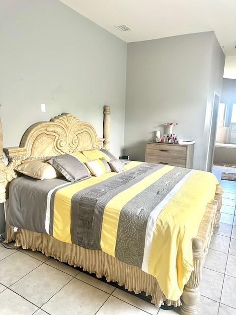 3315 18 W, Lehigh Acres, FL 33971 - tiled bedroom featuring visible vents