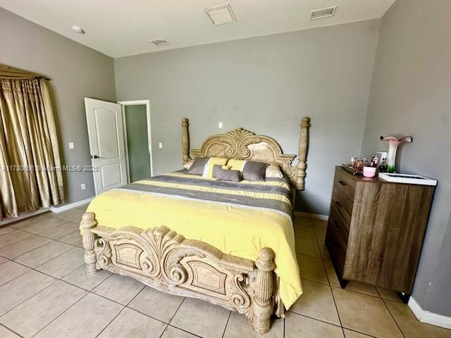 3315 18 W, Lehigh Acres, FL 33971 - bedroom featuring light tile patterned flooring, baseboards, and visible vents