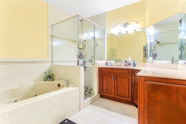 14070 SW 50th Ct, Miramar, FL 33027 - full bathroom with tile patterned flooring, a shower stall, a jetted tub, and vanity