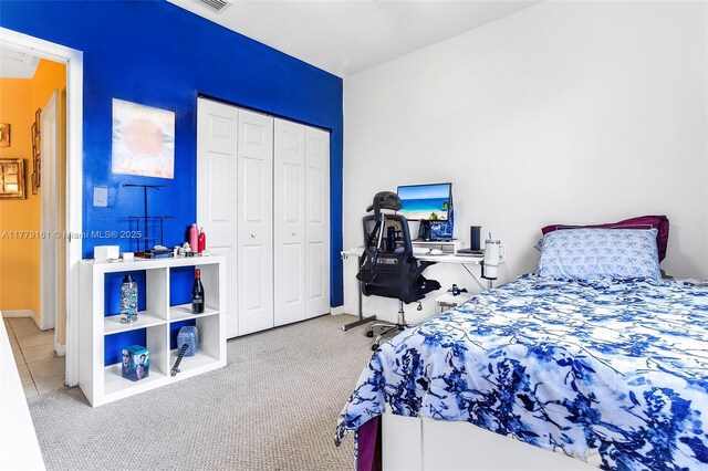 14070 SW 50th Ct, Miramar, FL 33027 - carpeted bedroom featuring a closet and baseboards