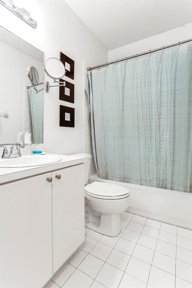 14070 SW 50th Ct, Miramar, FL 33027 - full bath featuring shower / bath combination with curtain, toilet, vanity, and tile patterned floors