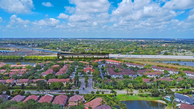 14070 SW 50th Ct, Miramar, FL 33027 - aerial perspective of suburban area with a large body of water