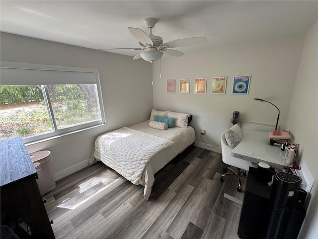 1235 Mariposa Ave Unit 1, Coral Gables, FL 33146 - bedroom with ceiling fan, baseboards, and wood finished floors