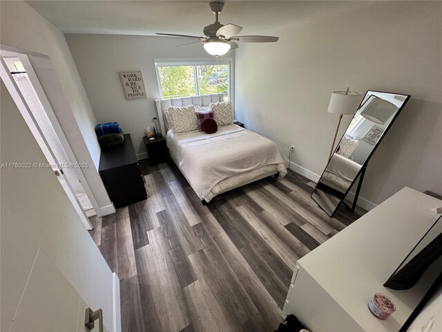 1235 Mariposa Ave Unit 1, Coral Gables, FL 33146 - bedroom with ceiling fan, baseboards, and wood finished floors