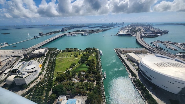 bird's eye view of a nearby body of water, a notable bridge, and a marina