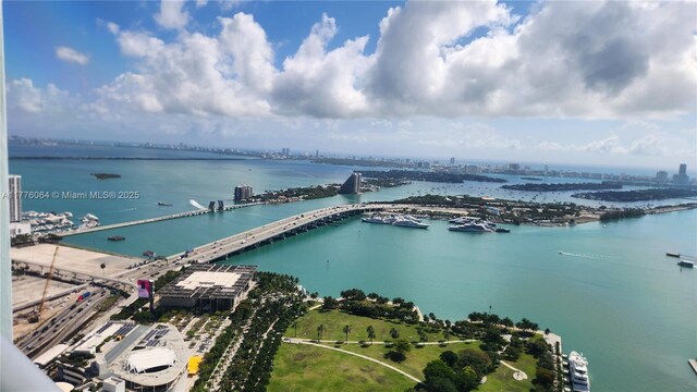 view of urban area with a notable bridge and a nearby body of water