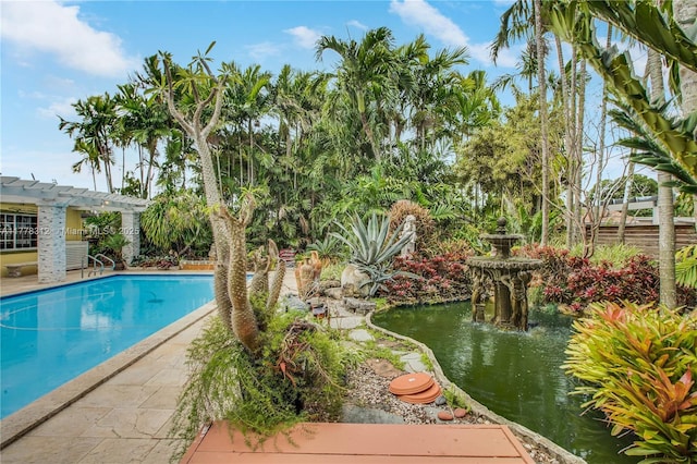 outdoor pool with a pergola