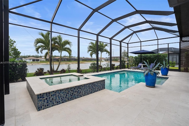 view of pool with a lanai, a patio area, a pool with connected hot tub, and a water view
