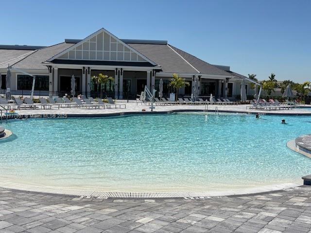 pool with a patio