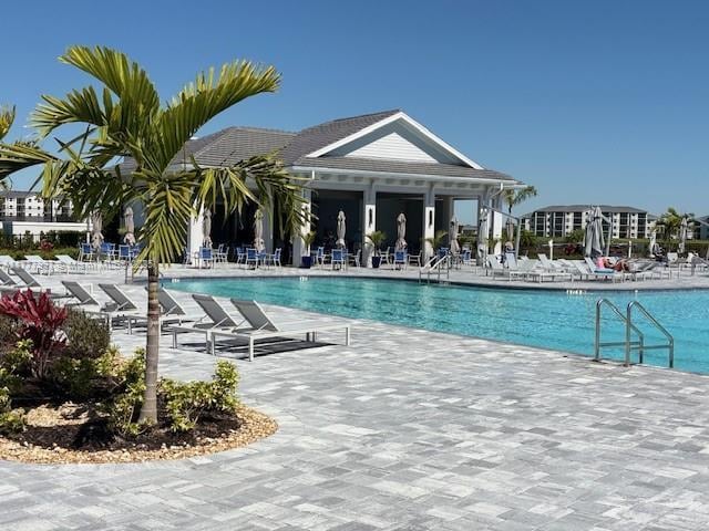 pool featuring a patio area