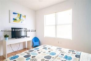 7326 Collins Ave Unit 102, Miami Beach, FL 33141 - bedroom with multiple windows