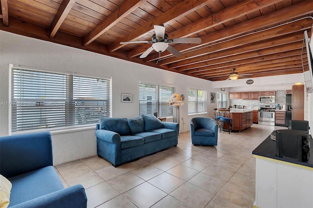 108 Long Ben Dr, Key Largo, FL 33037 - living area featuring wood ceiling, beam ceiling, and ceiling fan
