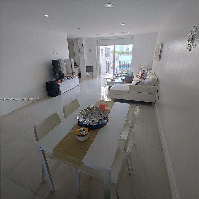 2750 NE 183rd St Unit 301, Aventura, FL 33160 - tiled dining area with baseboards and recessed lighting