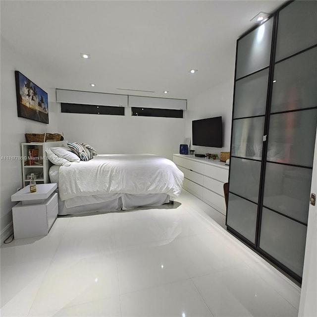 2750 NE 183rd St Unit 301, Aventura, FL 33160 - bedroom with recessed lighting and tile patterned flooring