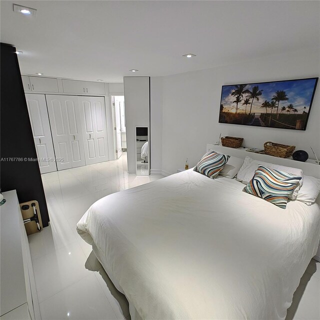 2750 NE 183rd St Unit 301, Aventura, FL 33160 - tiled bedroom with recessed lighting and a closet