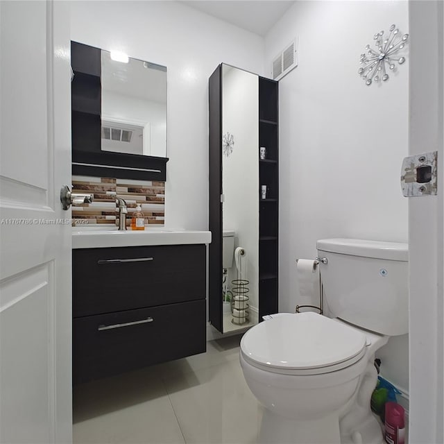2750 NE 183rd St Unit 301, Aventura, FL 33160 - bathroom featuring tile patterned flooring, vanity, visible vents, and toilet