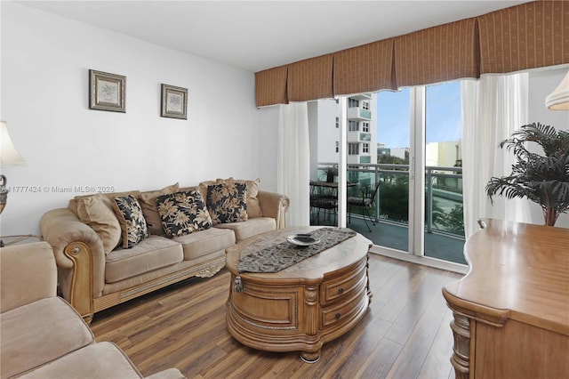 living area with wood finished floors