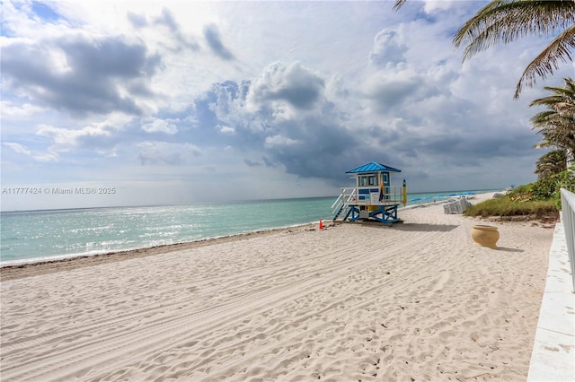property view of water with a beach view