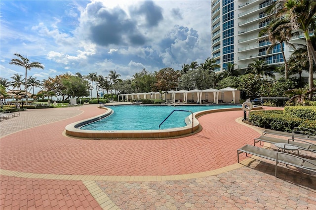 pool with a patio area