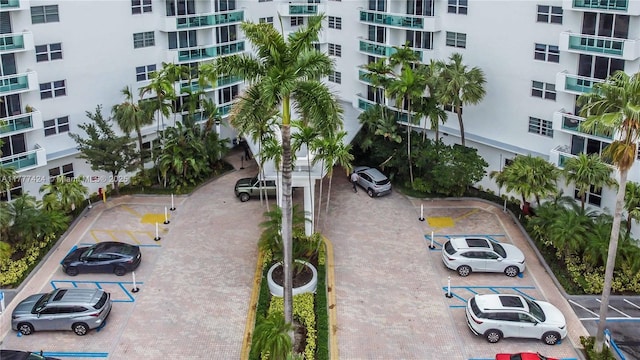 view of property featuring uncovered parking