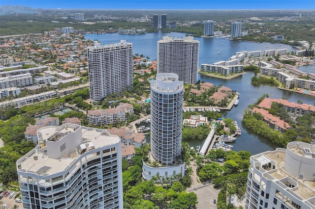 bird's eye view featuring a water view and a view of city