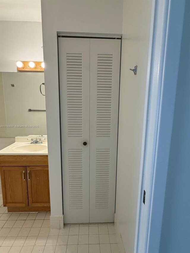 6720 NW 166th Ter Unit 401, Miami Lakes, FL 33014 - bathroom with tile patterned floors and vanity