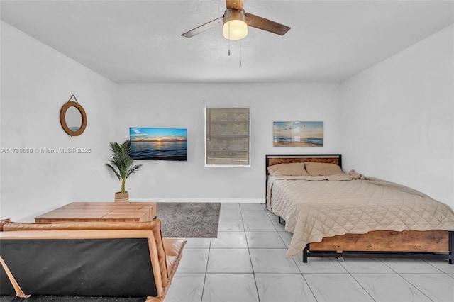 bedroom with light marble finish flooring and ceiling fan