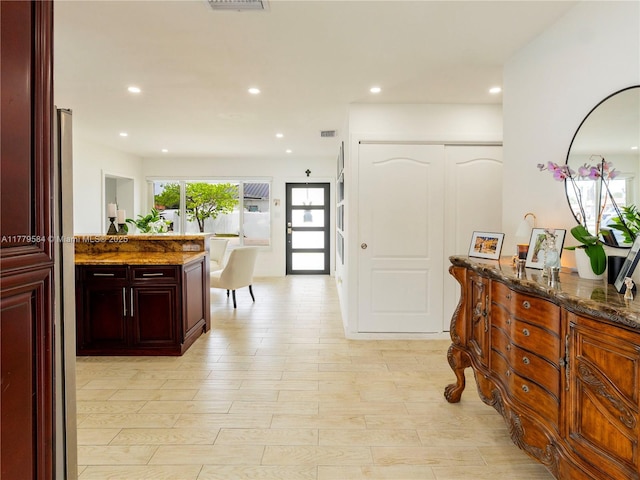 interior space with visible vents, light wood-style flooring, and recessed lighting