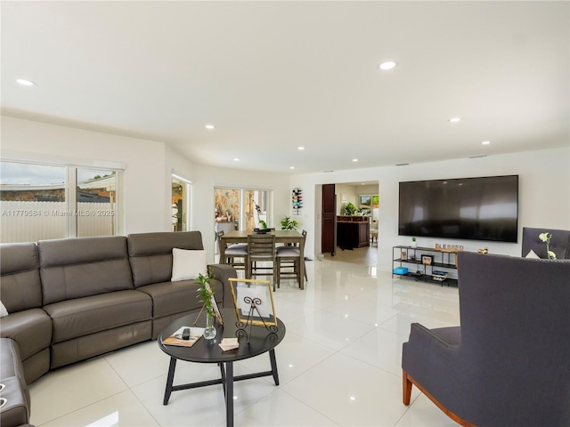 living room featuring light tile patterned floors and recessed lighting