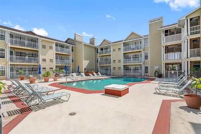 community pool featuring a patio