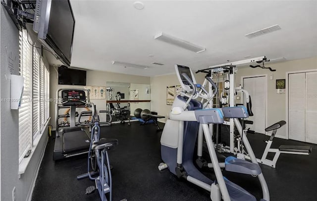 gym featuring visible vents