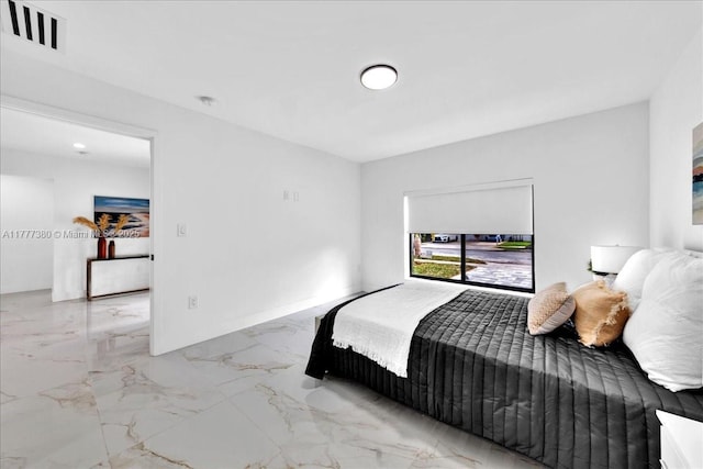 2021 SW 23rd St, Miami, FL 33145 - bedroom with light marble finish floors