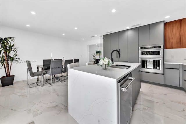 2021 SW 23rd St, Miami, FL 33145 - kitchen featuring modern cabinets, gray cabinets, a sink, and recessed lighting