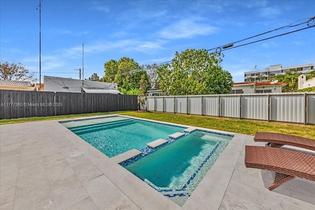 2021 SW 23rd St, Miami, FL 33145 - view of swimming pool featuring a pool with connected hot tub, a patio, and a fenced backyard