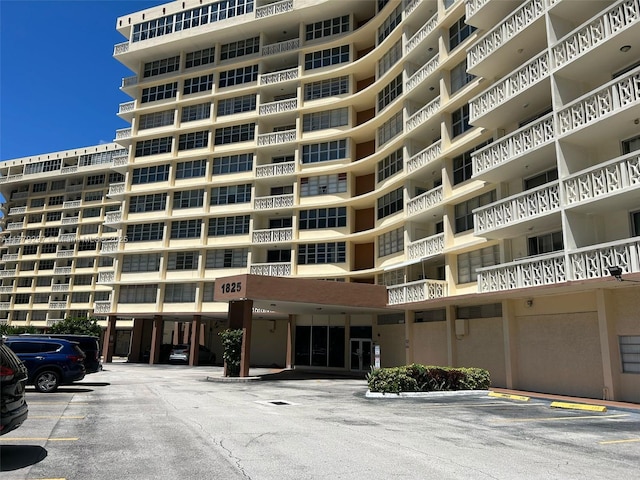 1825 S Ocean Dr Unit 503, Hallandale Beach, FL 33009 - view of apartment building / complex with uncovered parking