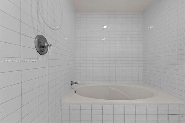 bathroom with tile walls