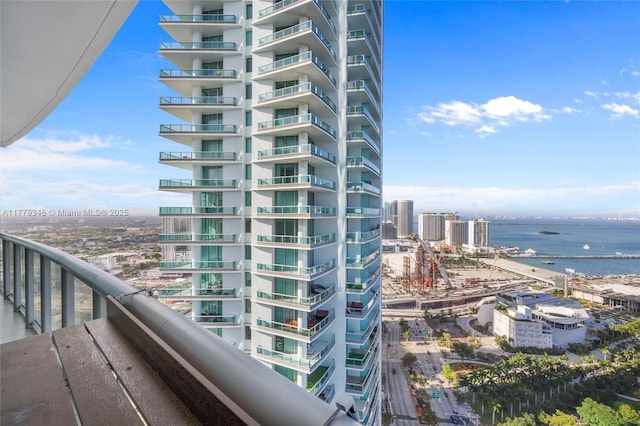 balcony with a city view and a water view