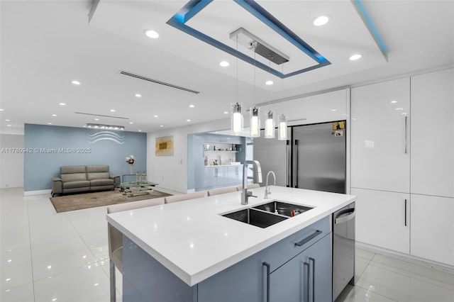 4140 N 36th Ave, Hollywood, FL 33021 - kitchen with recessed lighting, light countertops, modern cabinets, stainless steel appliances, and a sink