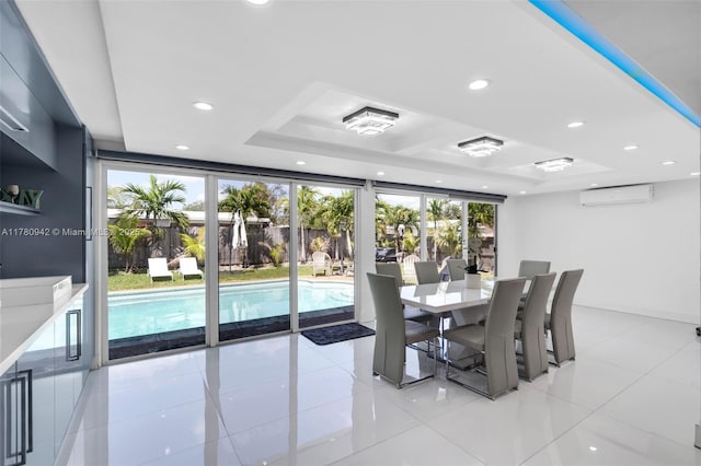 4140 N 36th Ave, Hollywood, FL 33021 - dining room with a tray ceiling, light tile patterned floors, an AC wall unit, and recessed lighting