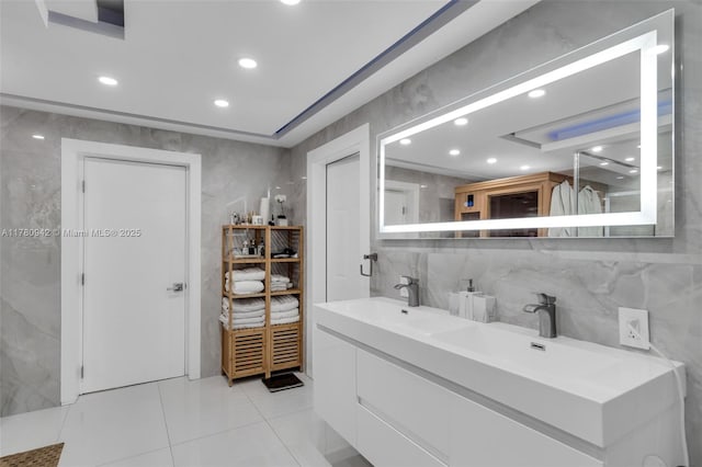 4140 N 36th Ave, Hollywood, FL 33021 - bathroom with recessed lighting, a sink, tile walls, and double vanity