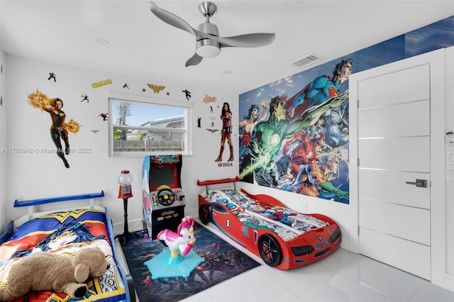 4140 N 36th Ave, Hollywood, FL 33021 - tiled bedroom featuring visible vents and ceiling fan