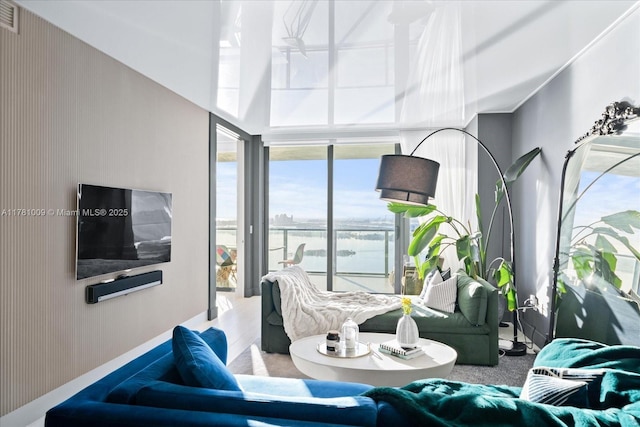 living room featuring visible vents